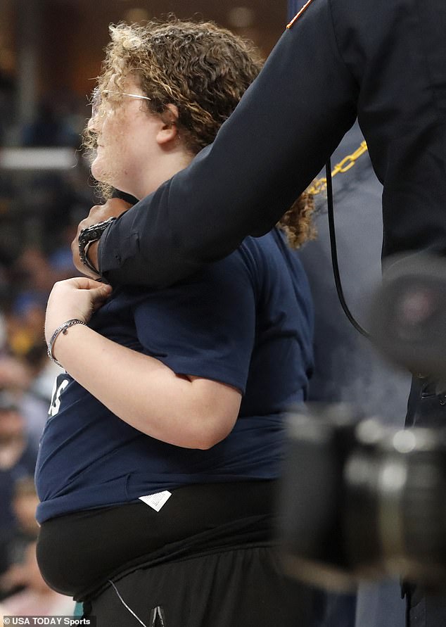 The activist even chained herself to a basket during the first half of the match (photo).  Rosenberg hopes recent actions during the playoffs will cause Taylor to retire from his farming business
