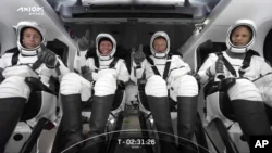 This file photo provided by SpaceX shows the AXIOM crew seated in the Dragon spacecraft Friday, April 8, 2022 in Cape Canaveral, Florida.  (SpaceX via AP, file)